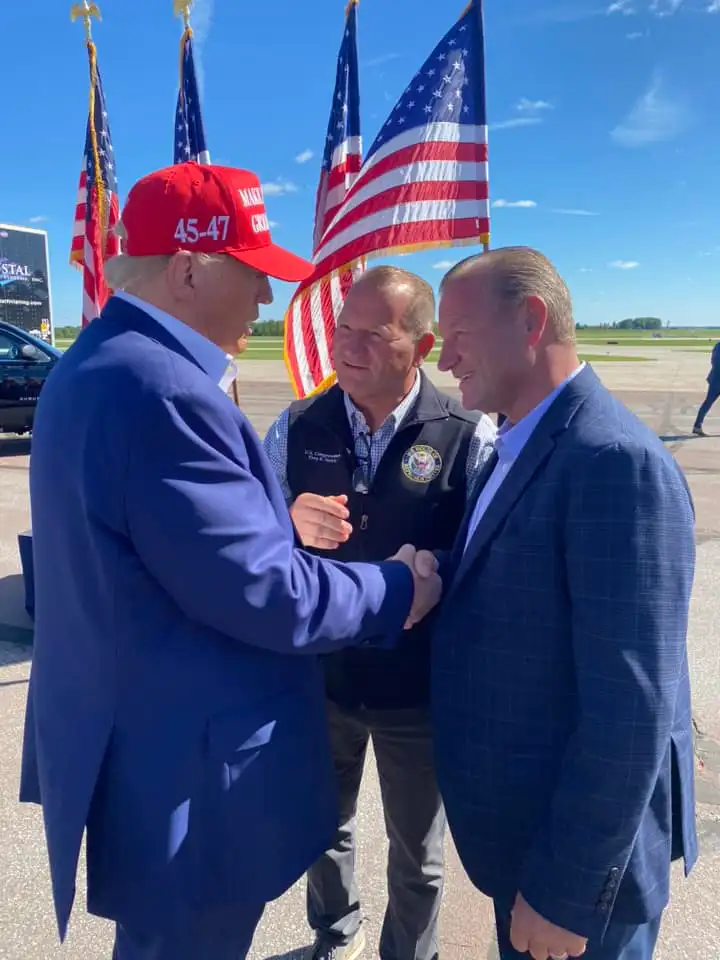The Nehls brothers greet President Donald Trump at a campaign rally in Mosinee, Wisconsin, on Sept. 8, 2024.