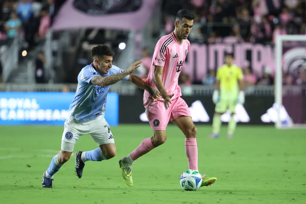 Sergio Busquets of Inter Miami CF challenged by Nicolás Fernández of New York City FC.