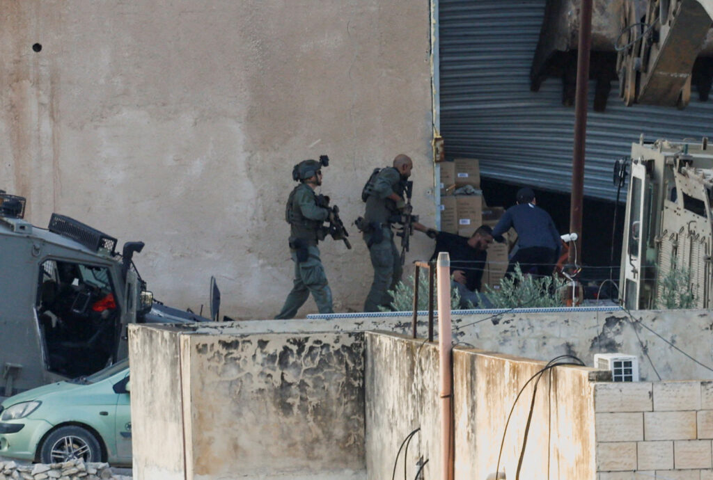 Israeli forces fatally shoot 2 Palestinians after they appeared to surrender