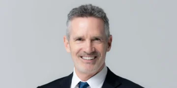 The former CEO of DocuSign says he promotes people based on 3 factors, and an Ivy League degree isn’t one of them