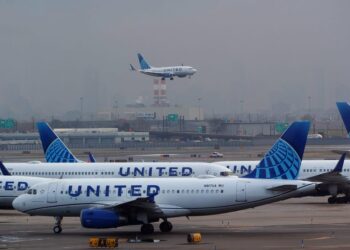 Images show dozens of planes in line to take off from Newark as shutdown chaos caused 4-hour-long delays