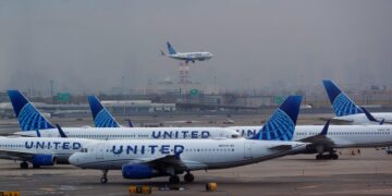 Images show dozens of planes in line to take off from Newark as shutdown chaos caused 4-hour-long delays