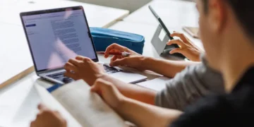 AI is winning over consumers — but it’s way behind with businesses, say Goldman Sachs analysts