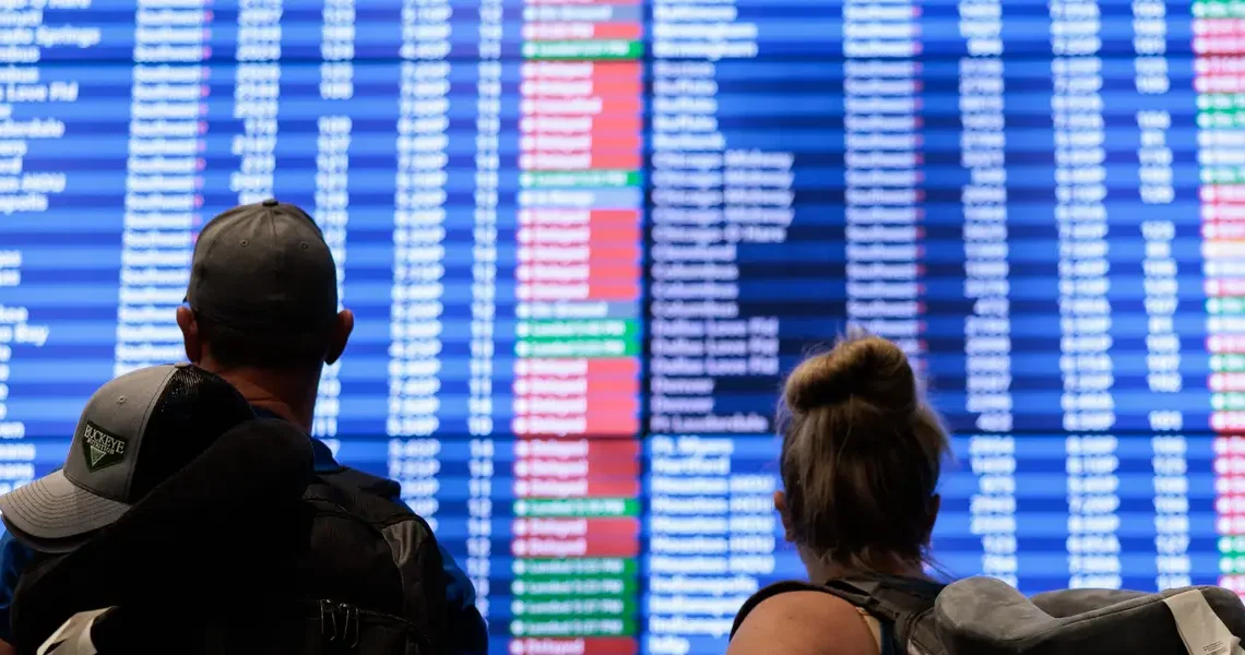 Mass delays and stranded travelers: Photos capture airport chaos amid the longest government shutdown in US history