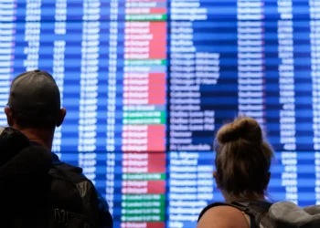 Mass delays and stranded travelers: Photos capture airport chaos amid the longest government shutdown in US history