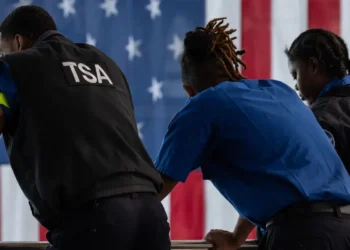 The government has reopened — but chaos for travelers and federal workers isn’t over yet