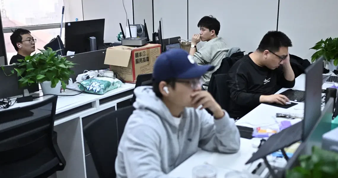 AI may lift wages — then crush them, professors say