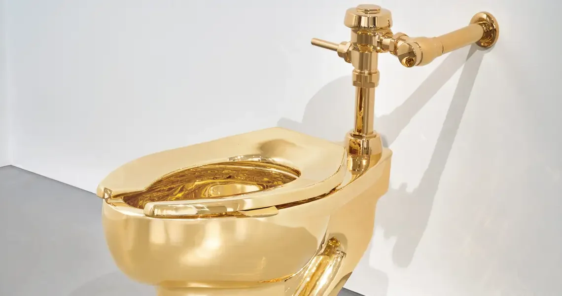 The artist behind the viral $6.2 million duct-taped banana also made a gold toilet — and it just sold for $12.1 million