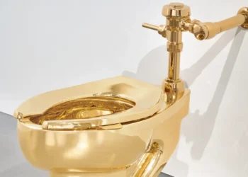 The artist behind the viral $6.2 million duct-taped banana also made a gold toilet — and it just sold for $12.1 million