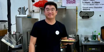 I traded software engineering for 17-hour work days as a prawn noodle hawker. It’s lonely, hot, and somehow rewarding.