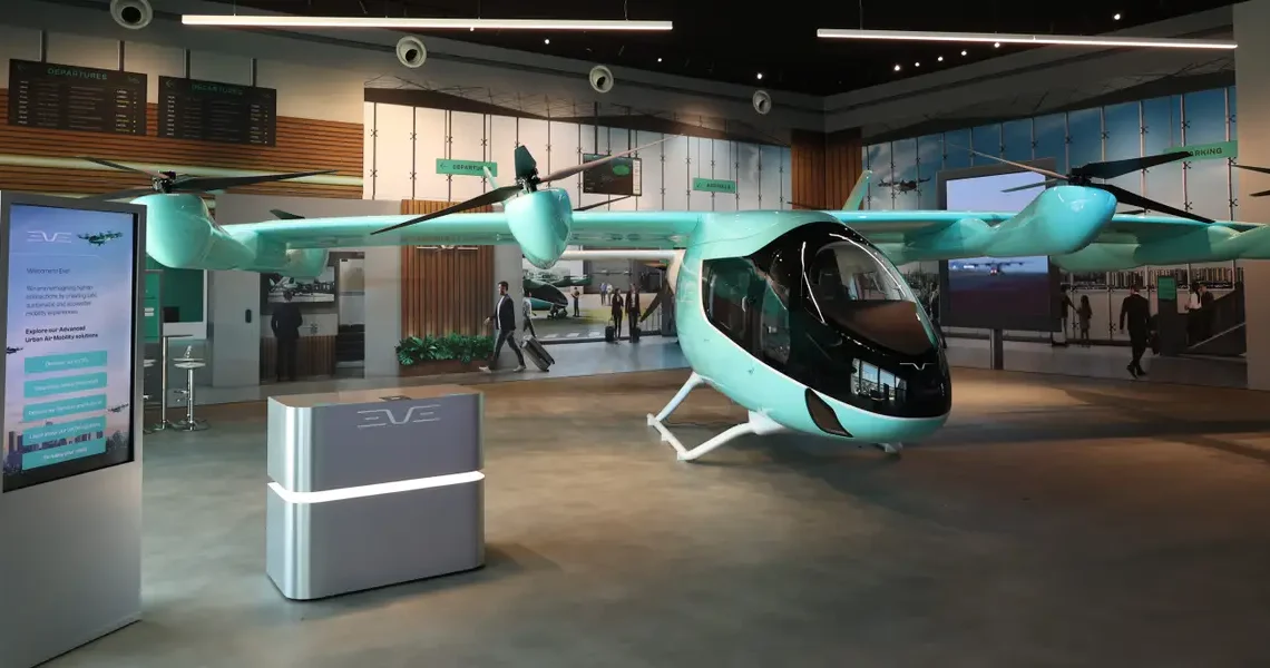 Flying taxi CEO said Embraer’s yet-to-fly aircraft will soar over traffic by 2027 and eventually be pilotless. Meet Eve.