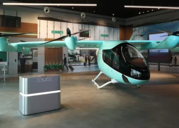 Flying taxi CEO said Embraer’s yet-to-fly aircraft will soar over traffic by 2027 and eventually be pilotless. Meet Eve.