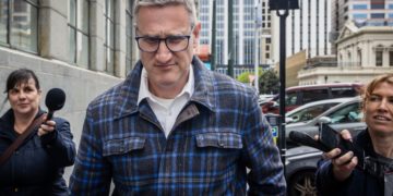 A top New Zealand ex-police official pleads guilty to viewing child sexual abuse material at work