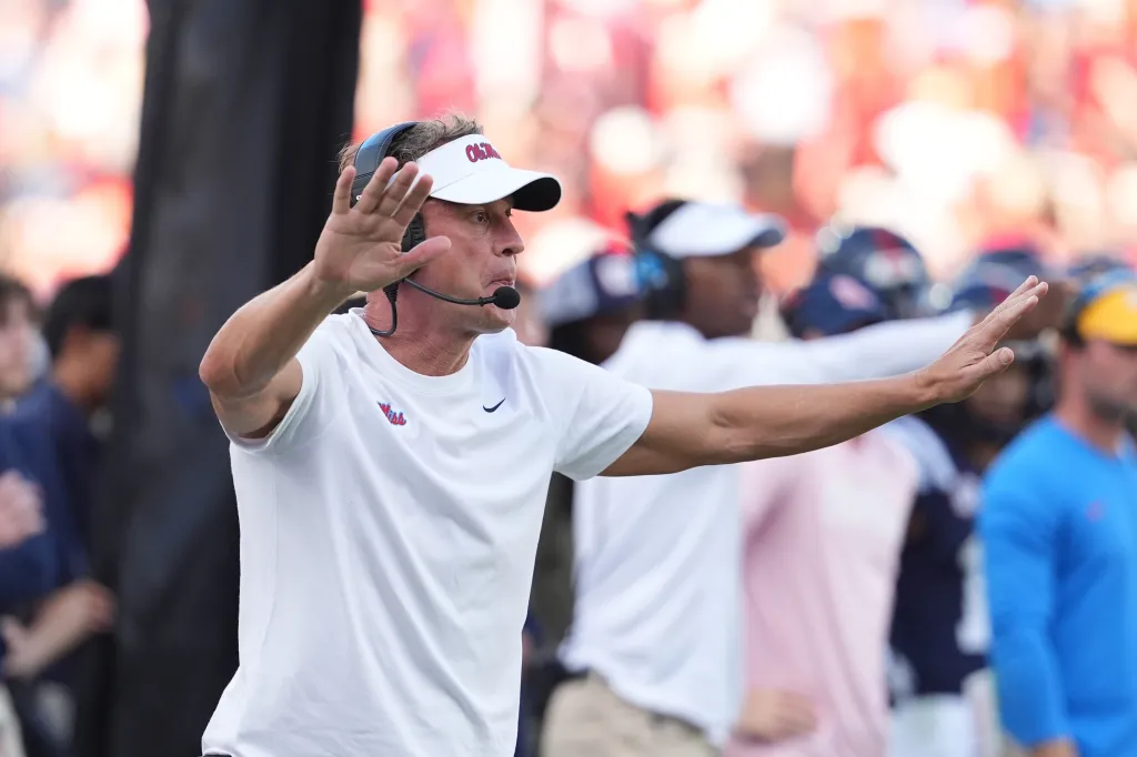 Mississippi head coach Lane Kiffin calls out to his offense during the second half of an NCAA college football game against The Citadel