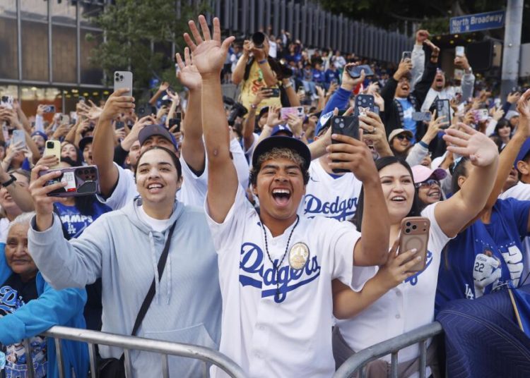 Arellano: From far away, an L.A. couple grapples with all-too-familiar debate after Dodgers win