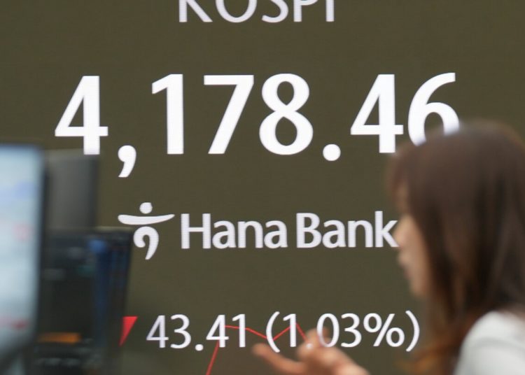 Asian shares trade mixed after AI darlings prop up Wall Street