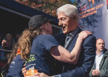Bill Clinton spotted at NYC Marathon with bandaged nose while cheering on daughter Chelsea
