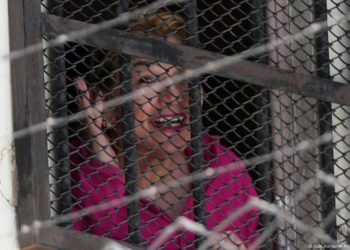 Bolivia court overturns former interim president sentence