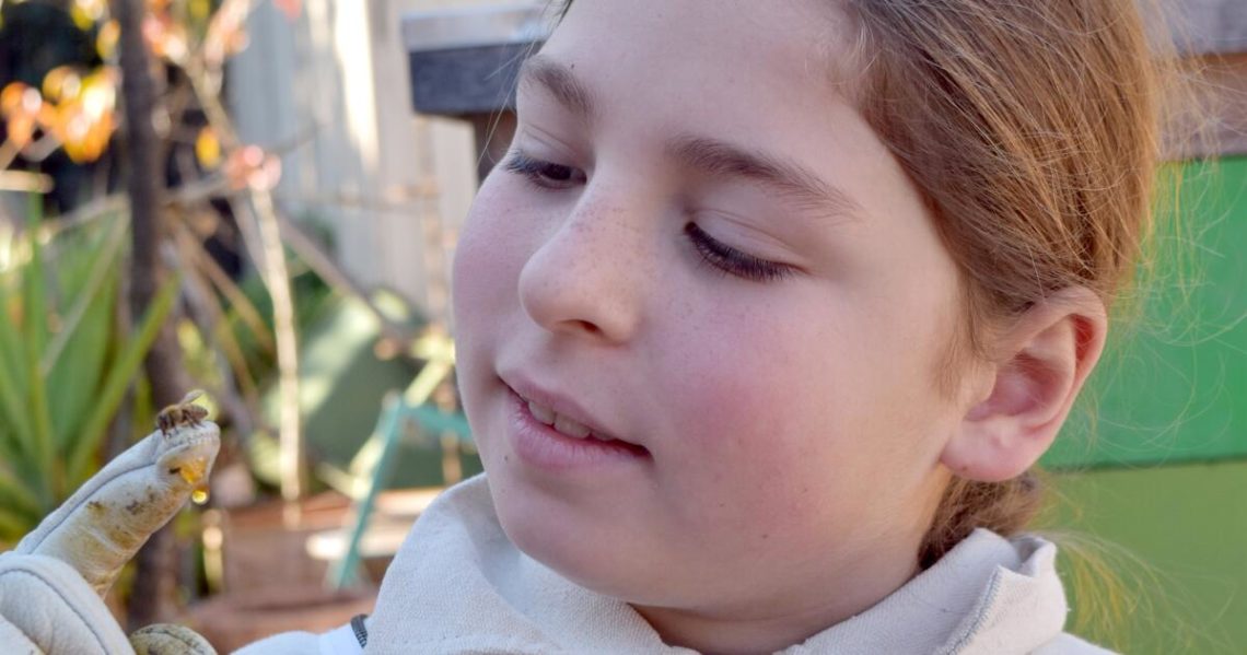 California city tried to stamp out 10-year-old’s beehive project. Saving the bees was a lesson in love