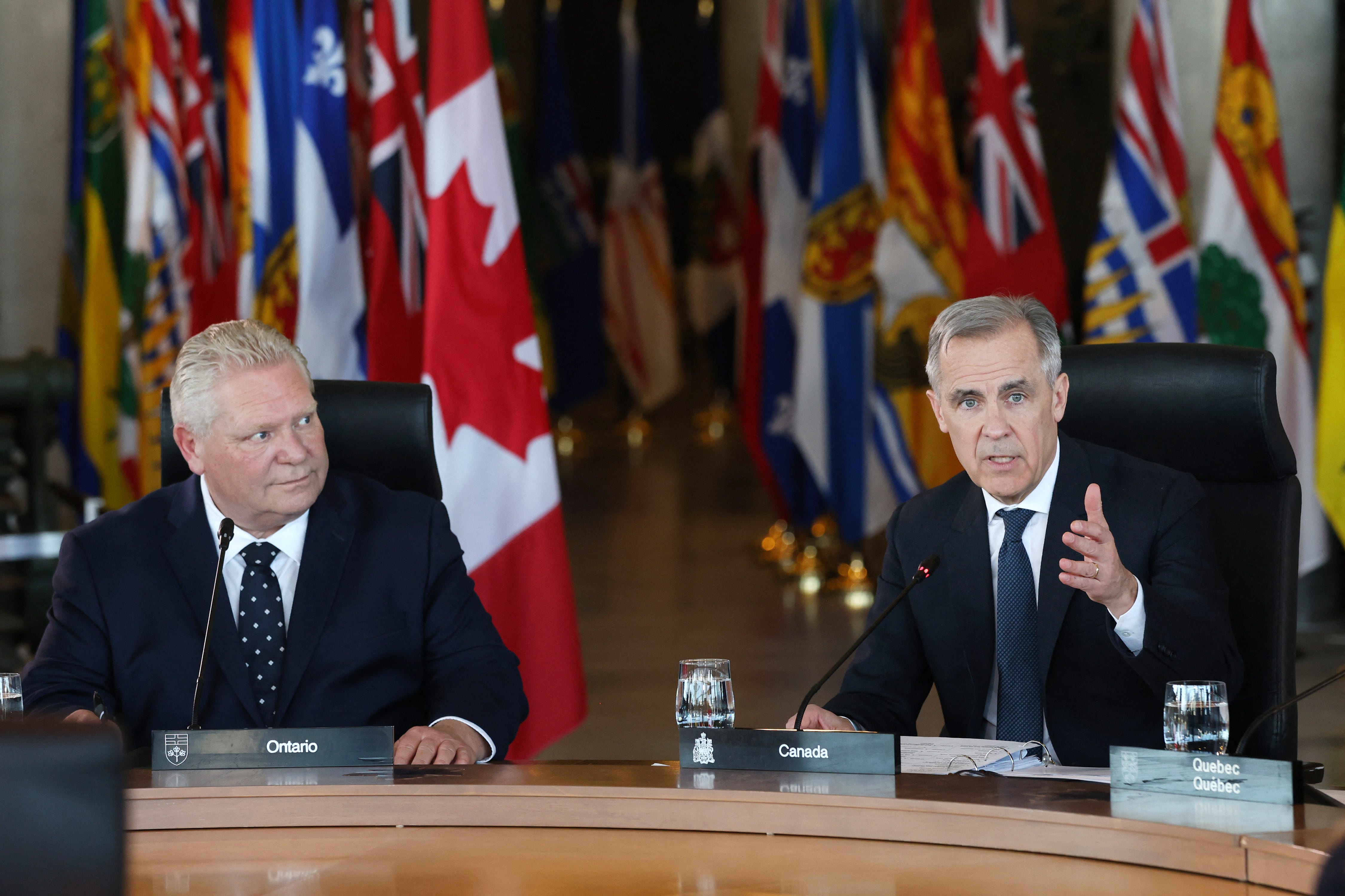 Ontario Premier Doug Ford (left) and Canadian Prime Minister Mark Carney (right)