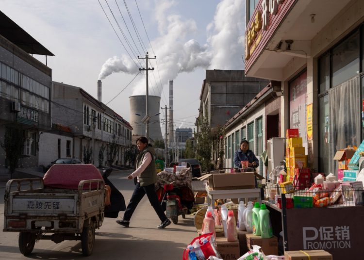 China’s emissions to peak later than previously forecast, experts say