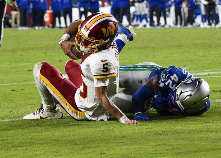 Commanders’ Jayden Daniels suffers gruesome arm injury in loss to Seahawks