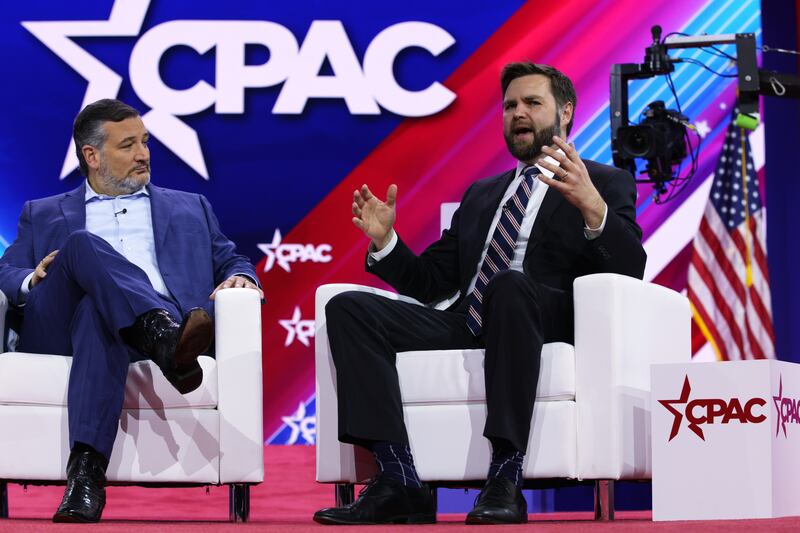 NATIONAL HARBOR, MARYLAND - MARCH 02: U.S. Sen. J.D. Vance (R-OH) (R) speaks as Sen. Ted Cruz (R-TX) (L) listens during the annual Conservative Political Action Conference (CPAC) at Gaylord National Resort & Convention Center on March 2, 2023 in National Harbor, Maryland. The annual conservative conference kicks off today with former President Donald Trump addressing the event on Saturday. (Photo by Alex Wong/Getty Images)