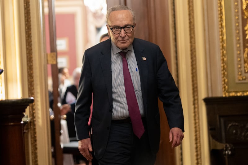 Senate Minority Leader Chuck Schumer, pictured leaving the Democratic caucus meeting on November 9, is under fire after a group of eight Senate Democrats caved and reached a deal with Republicans to end the government shutdown even though he voted against moving forward with it.