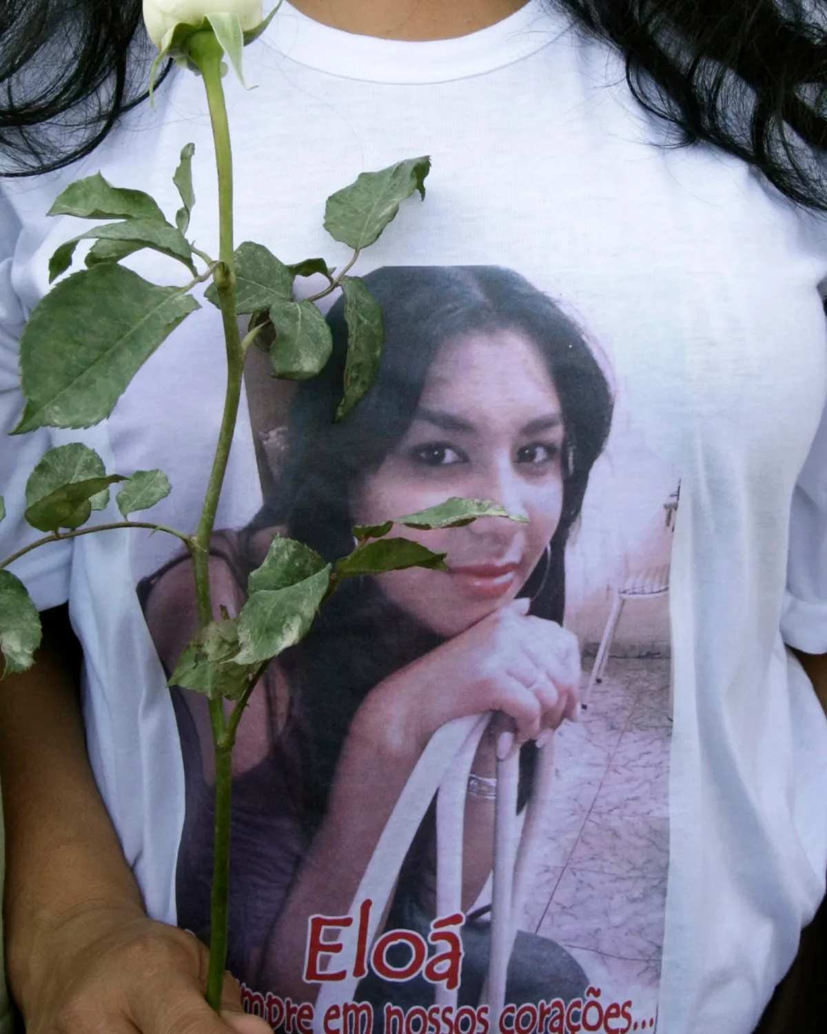 A woman attends the funeral of Pimentel in Santo Andre outskirts of Sao Paulo