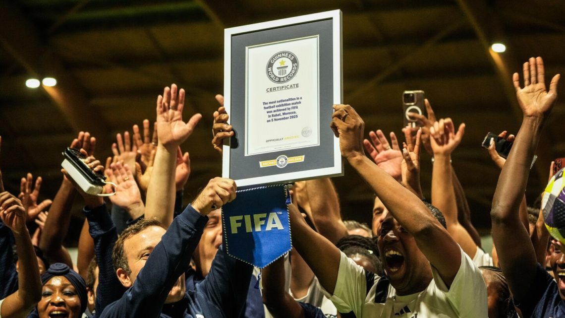 FIFA co-workers break Guinness World Record for most multinational soccer game