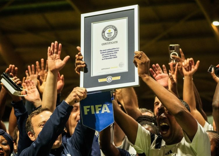 FIFA co-workers break Guinness World Record for most multinational soccer game