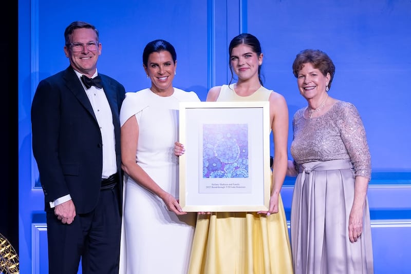 Stefany Shaheen (second left) with her mom, Jeanne (right).