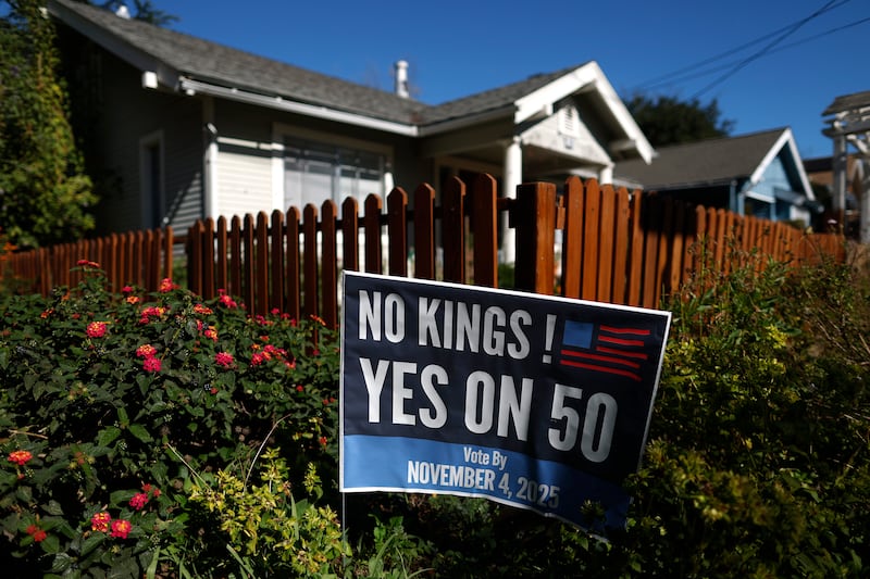 No Kings/yes on 50 sign in front of a home in California