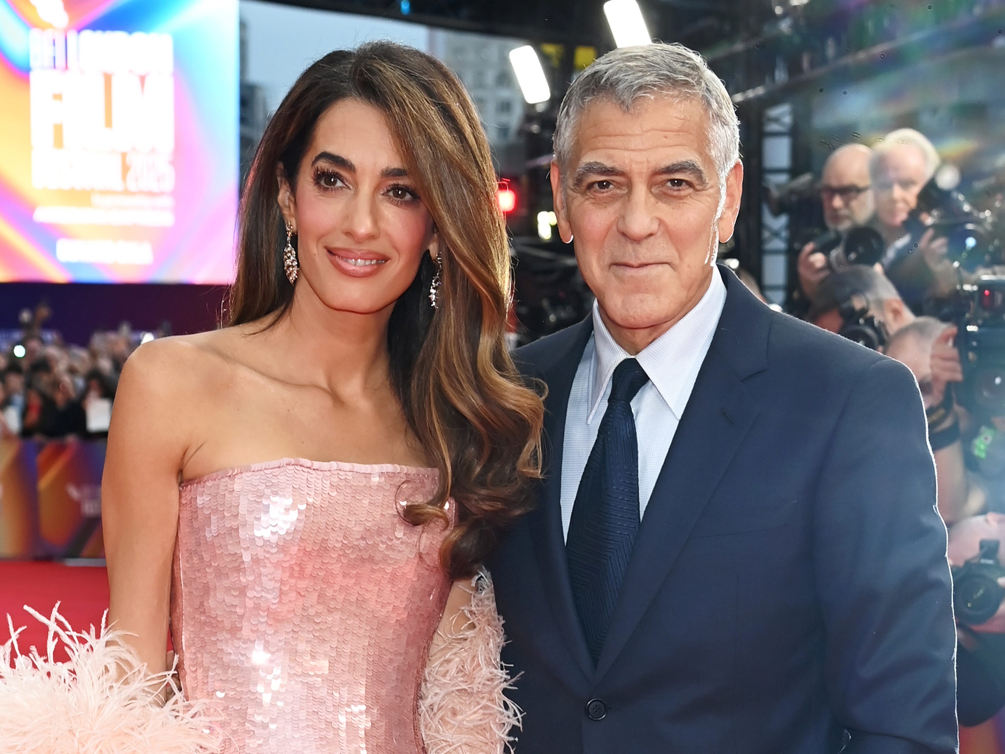 George Clooney and Amal Clooney.