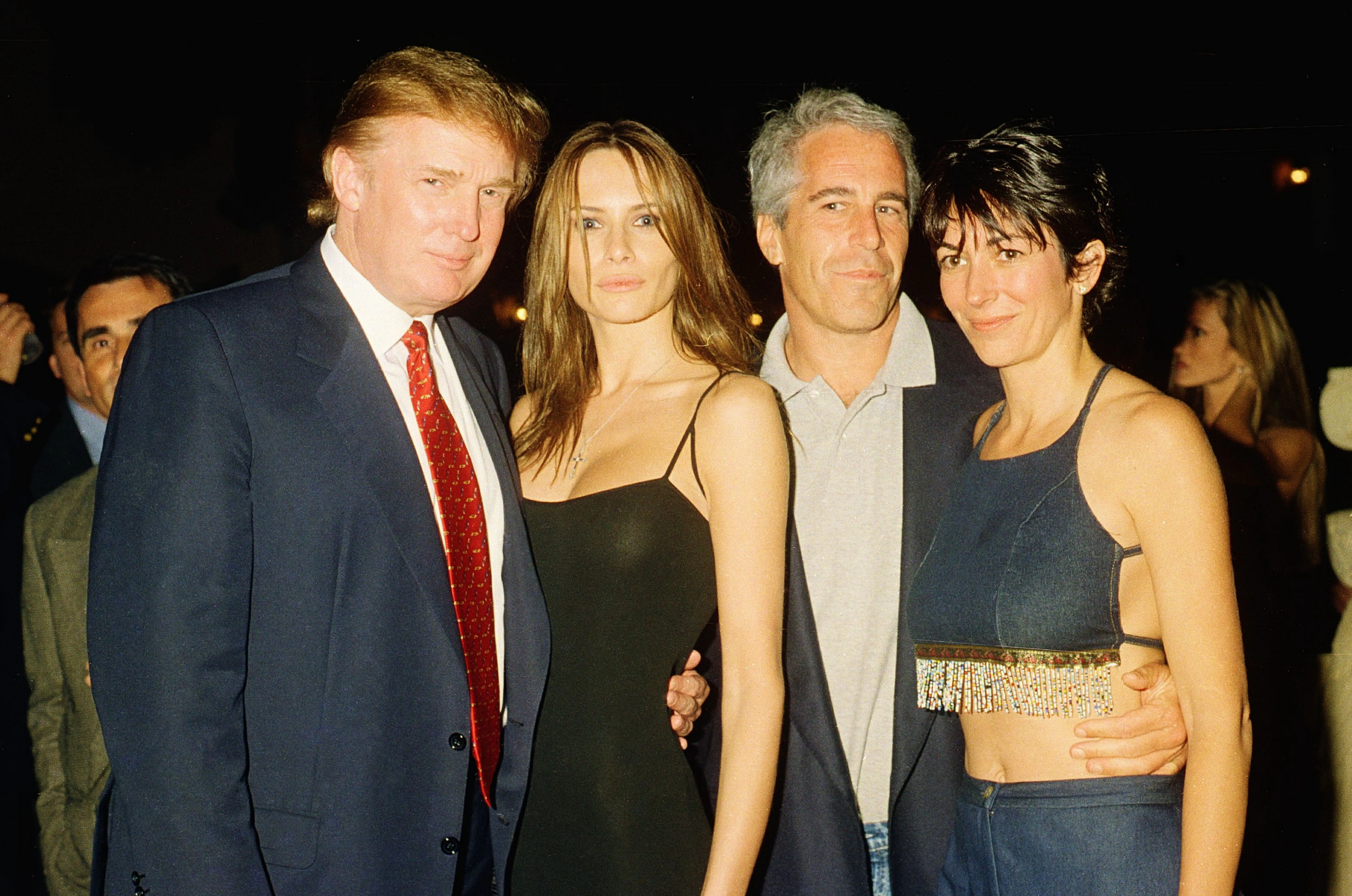Trump, Melania, Epstein, and Maxwell pose for a photo