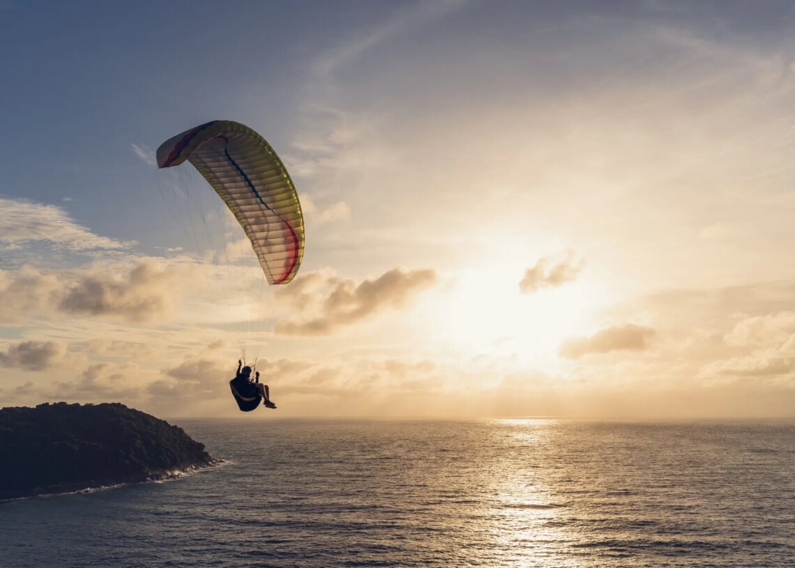 Skydiver Captured Falling Across the Sun in Perfect Shot