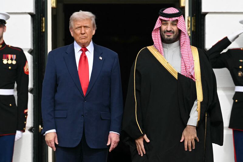 US President Donald Trump greets Crown Prince and Prime Minister of the Kingdom of Saudi Arabia Mohammed bin Salman on the South Lawn at the White House in Washington, DC on November 18, 2025. (Photo by SAUL LOEB / AFP) (Photo by SAUL LOEB/AFP via Getty Images)