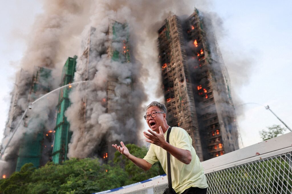 Fire engulfs high-rise buildings in Hong Kong, killing 4 people