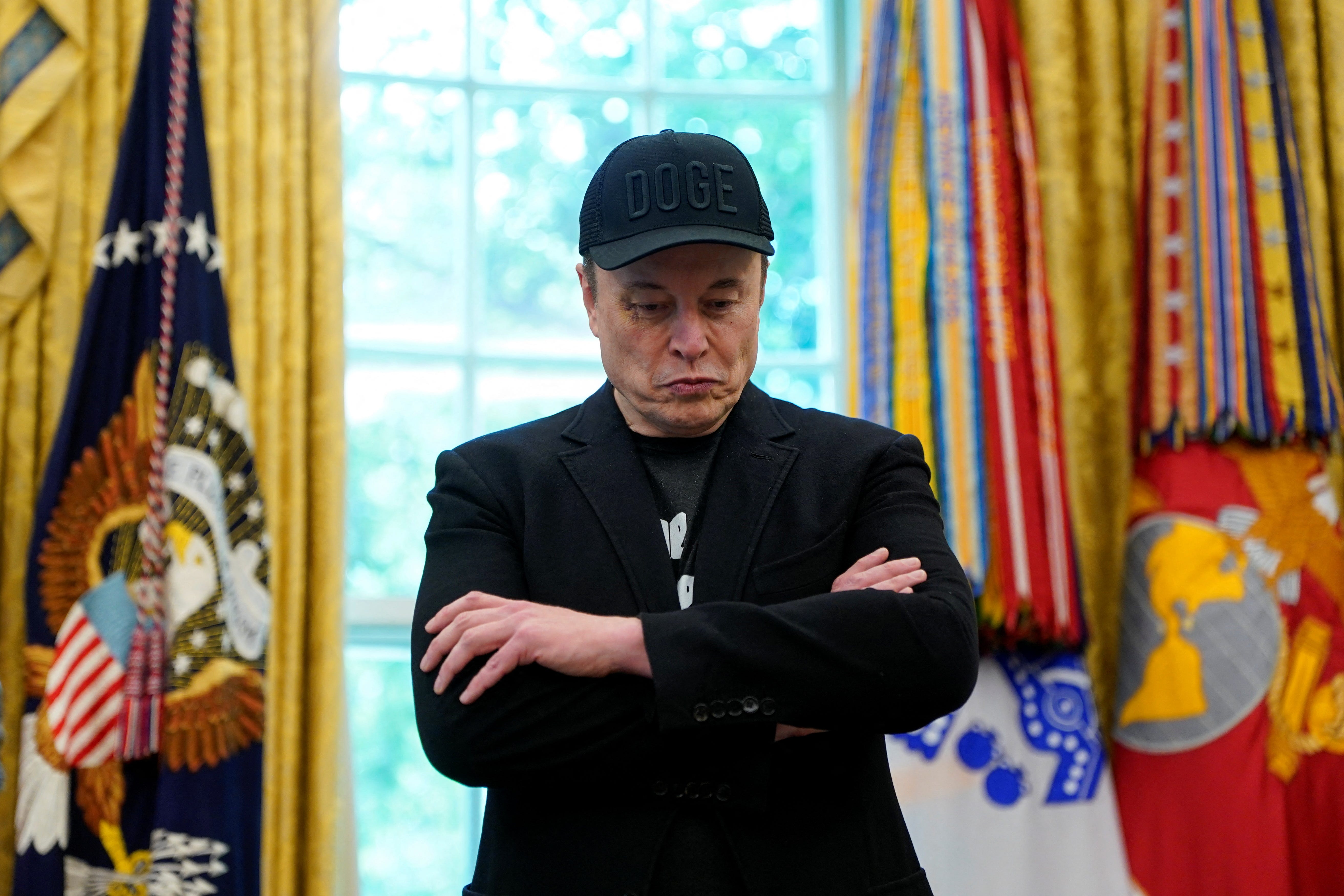 U.S. President Donald Trump and Elon Musk attend a press conference at the White House