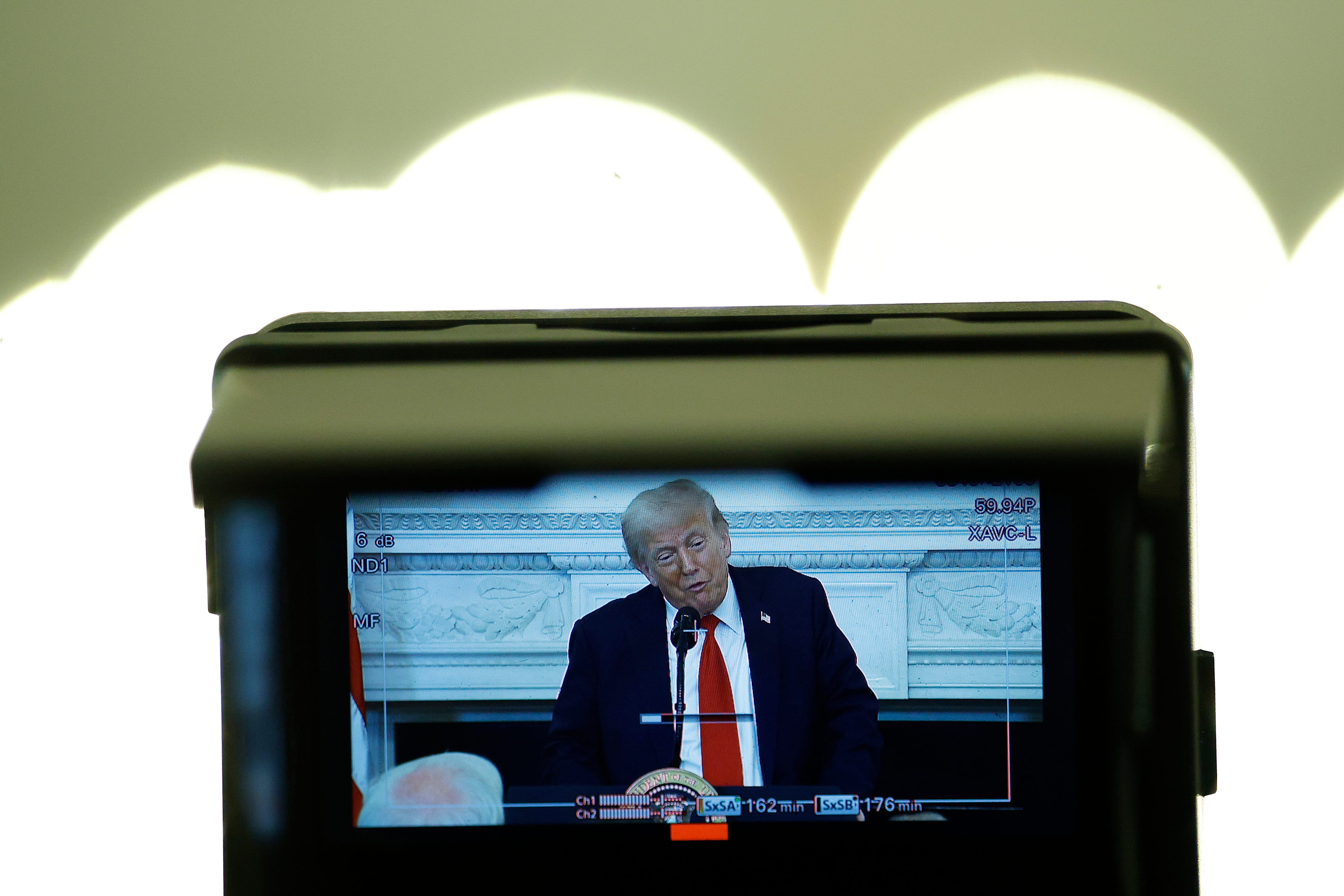 Donald Trump on a camera lens