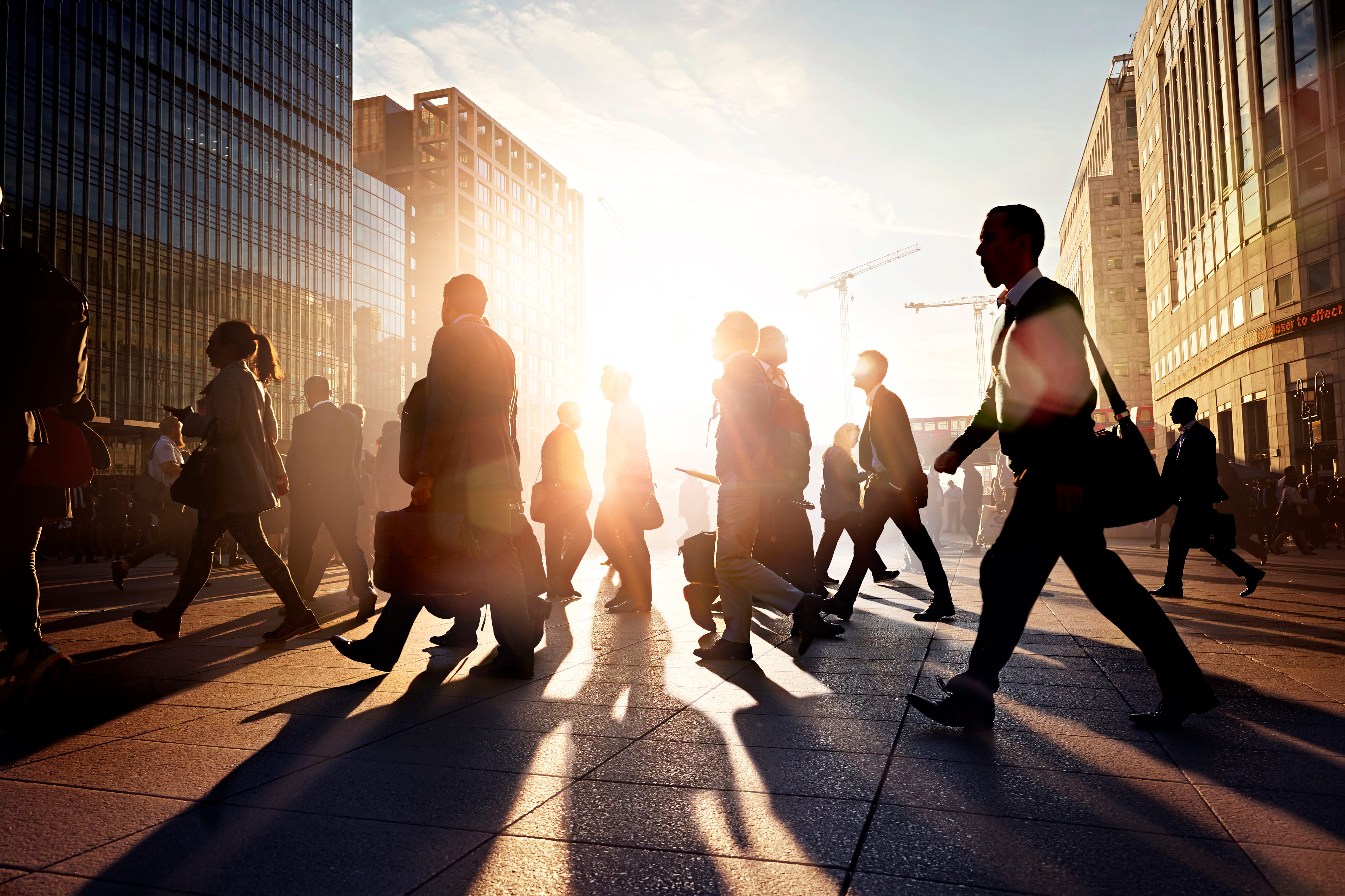 Workers walking on a street