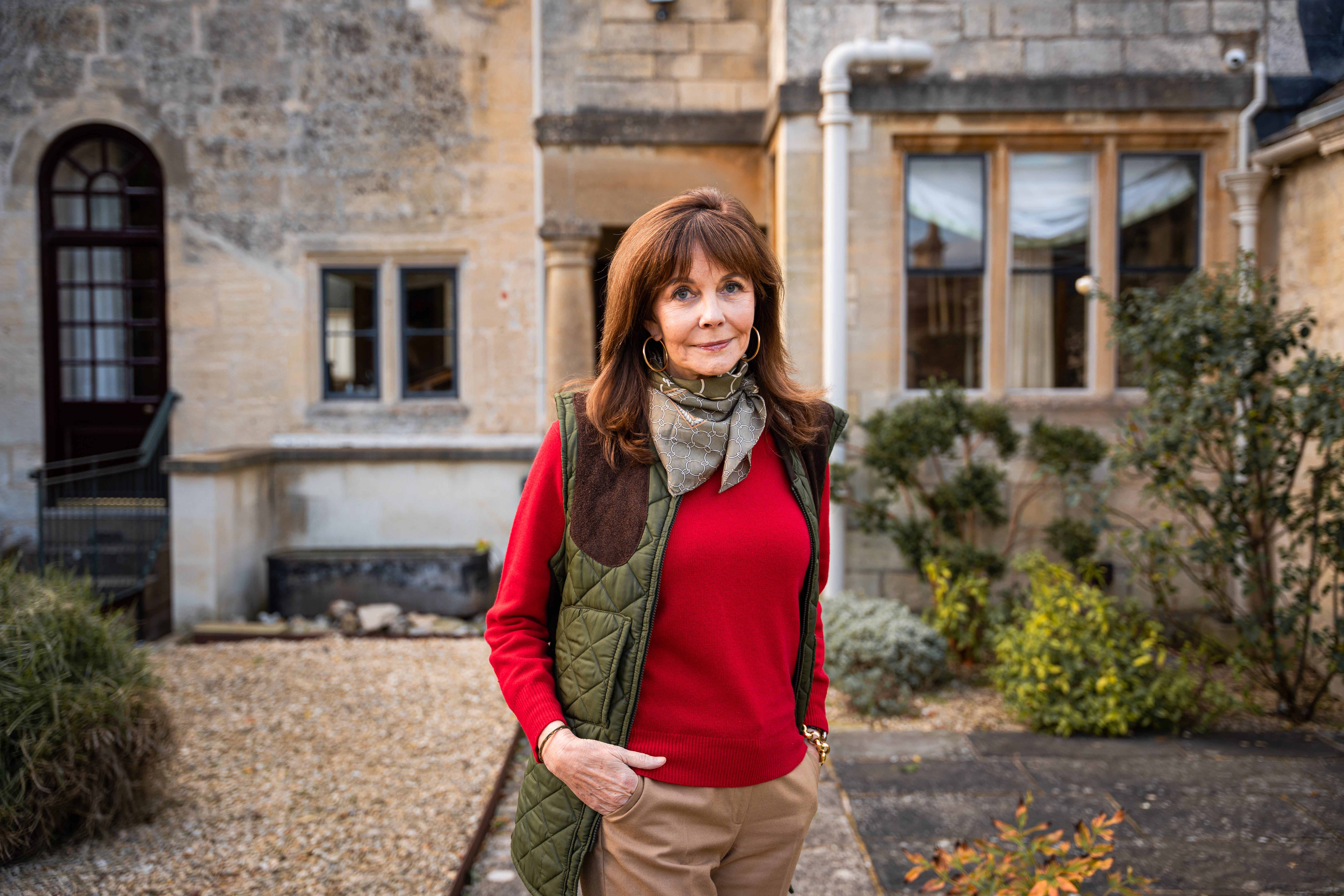 Frances Schultz is in the backyard of her house