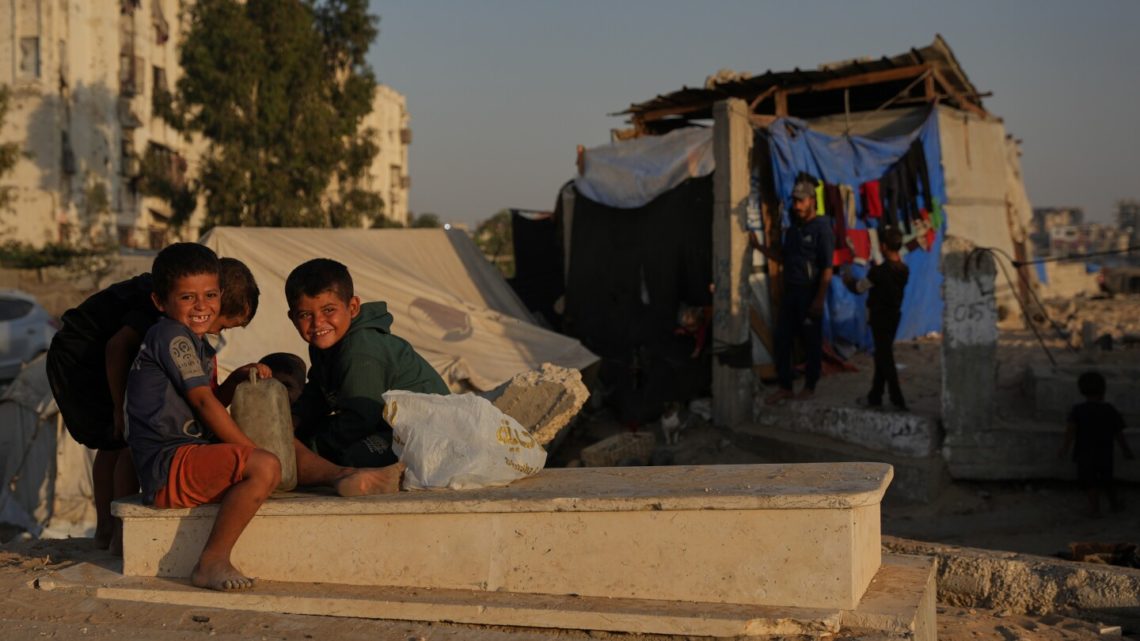 In Gaza cemeteries, some displaced Palestinians live among the dead