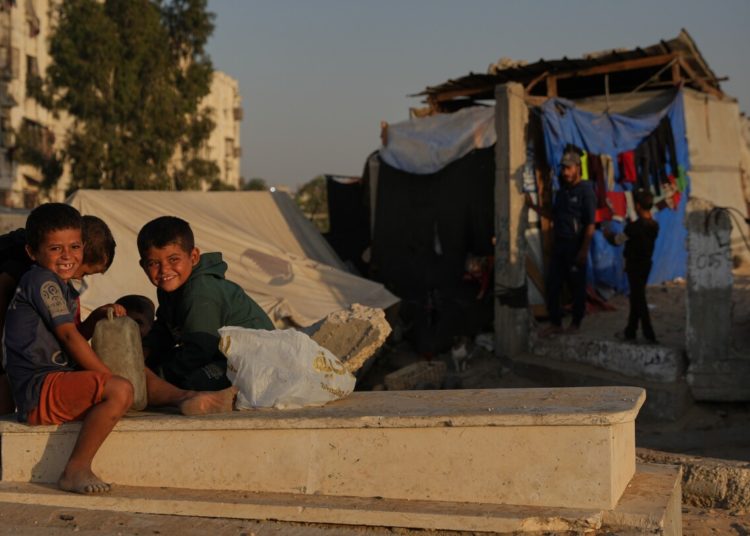 In Gaza cemeteries, some displaced Palestinians live among the dead