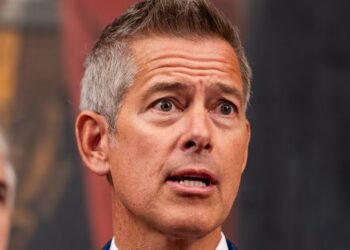 Trump’s Transport Goon Mocked Over Travel Dress Code Obsession