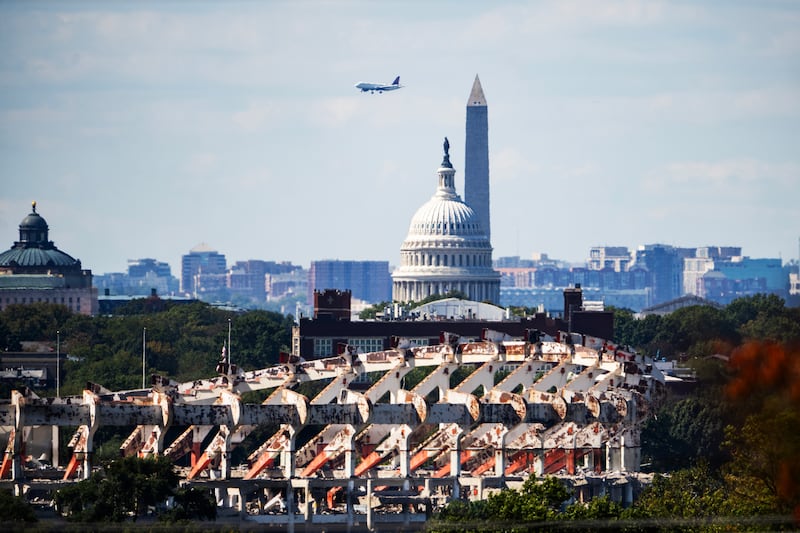 UNITED STATES - OCTOBER 6: The partially demolished Robert F. Kennedy Memorial Stadium is seen with the U.S. Capitol and Washington Monument on Monday, October 6, 2025. The new Commanders stadium will be built on the site and is expected to open in 2030. (Tom Williams/CQ-Roll Call, Inc via Getty Images)