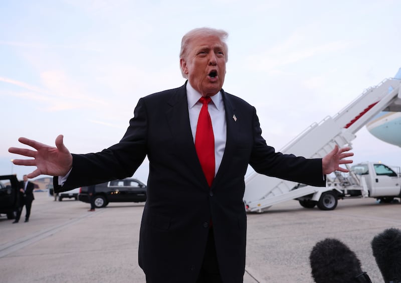 JOINT BASE ANDREWS, MARYLAND - NOVEMBER 09: U.S. President Donald Trump gives brief remarks to members of the press after exiting Air Force One on November 9, 2025 at Joint Base Andrews, Maryland. Trump spent the weekend at his Mar-A-Lago estate in Palm Beach, Florida. (Photo by Tasos Katopodis/Getty Images)