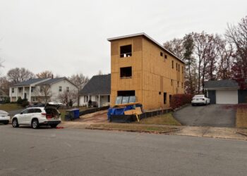 A hulking home addition is dividing neighbors and stumping officials