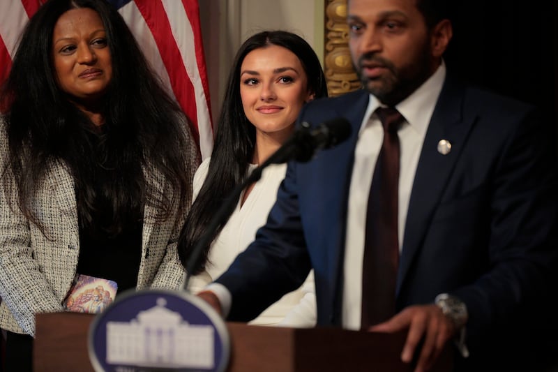 WASHINGTON, DC - FEBRUARY 21: New Federal Bureau of Investigation Director Kash Patel speaks as his girlfriend Alexis Wilkins (C) looks on during his swearing in ceremon in the Indian Treaty Room in the Eisenhower Executive Office Building on February 21, 2025 in Washington, DC. Patel was confirmed by the Senate 51-49, with Sen. Susan Collins (R-ME) and Sen. Lisa Murkowski (R-AK) the only Republicans voting to oppose him. Patel has been a hard-line critic of the FBI, the nation’s most powerful law enforcement agency. (Photo by Chip Somodevilla/Getty Images)