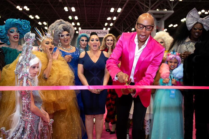RuPaul (C) with Michelle Visage during the ceremonial ribbon cutting at RuPaul's DragCon NYC 2018 at Javits Center on September 29, 2018 in New York City.